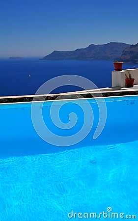 Santorini by the pool Stock Photo
