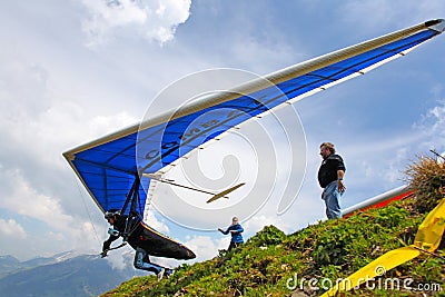 SANTS, SWITZERLAND - May 27: Competitor Ievgen Lysenko from Ukraine of the Swiss Masters hang gliding competitions takes part on M Editorial Stock Photo