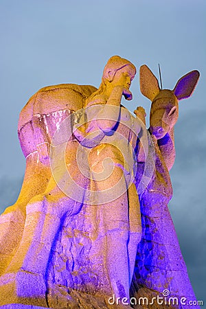 Sculpture `Deer turned his head` on the top of the mountain in Luhuitou Park, Sanya, island Hainan, China Editorial Stock Photo