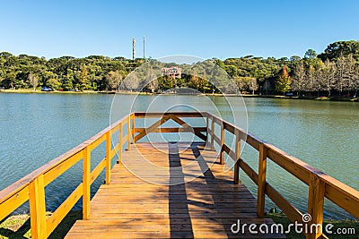 Sao Bernardo Lake in late Autumn, view from a wooden pier - Sao Francisco de Paula, Brazil Stock Photo