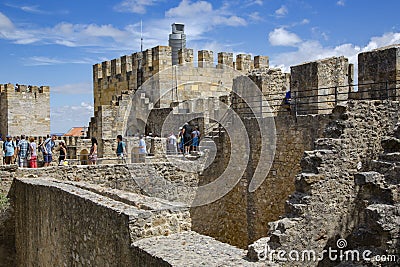 Sao Jorge castle or St. George castle with visitors Editorial Stock Photo