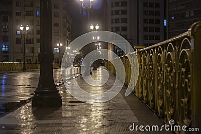 Blured of rainy night view of the iron grid of the Santa Ifigenia viaduct Editorial Stock Photo