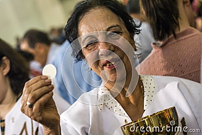 Faithful during the Catholic Mass in honor of St. Jude Day Editorial Stock Photo