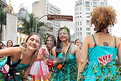 Sao Paulo, Brazil - October, 20 2017. Costumed women are having fun in outdoor event. Editorial Stock Photo