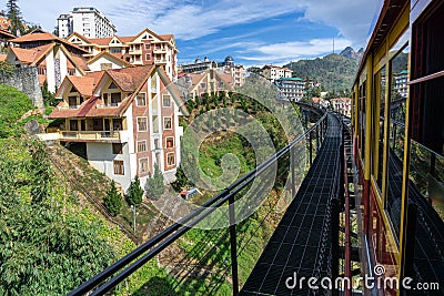 Sapa town viewing from tourist mountain tram, the transporation to Fansipan cable car station in Sapa town, Vietnam Stock Photo