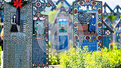 Sapanta, Maramures, Romania - June 17, 2022: Painted blue wooden monuments in an unique in the World Editorial Stock Photo