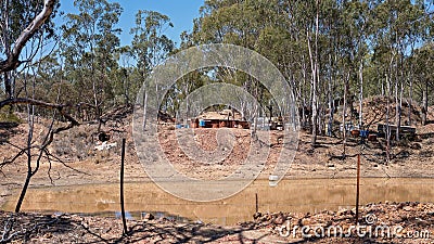 Sapphire Diggings Beside A Dam Stock Photo