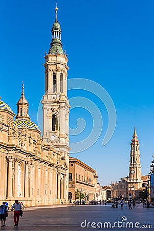 SARAGOSSA, SPAIN - SEPTEMBER 27, 2017: People near the Cathedral-Basilica of Our Lady of the Pillar - Roman Catholic Church. Verti Editorial Stock Photo