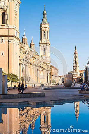 SARAGOSSA, SPAIN - SEPTEMBER 27, 2017: People near the Cathedral-Basilica of Our Lady of the Pillar - Roman Catholic Church. Verti Editorial Stock Photo
