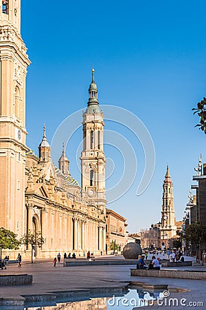 SARAGOSSA, SPAIN - SEPTEMBER 27, 2017: People near the Cathedral-Basilica of Our Lady of the Pillar - Roman Catholic Church. Editorial Stock Photo