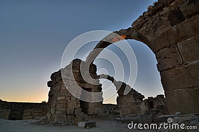 The Saranta Kolones ruins at dusk. Paphos Archaeological Park. Cyprus Stock Photo
