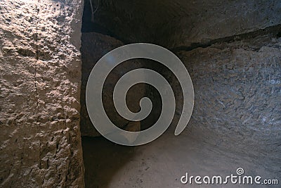 Saratli, Turkey - August 27, 2020: The interior of an ancient underground city on the territory of Cappadocia. Stone hatch, Editorial Stock Photo