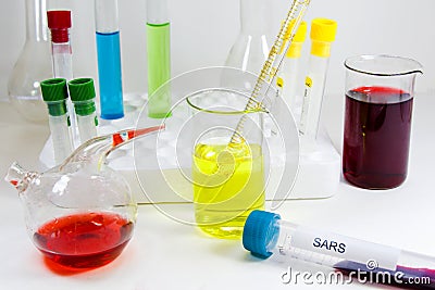Sars viruses blood test tube and chemical elements, laboratory diagnoses, studio shoot on the white background Stock Photo