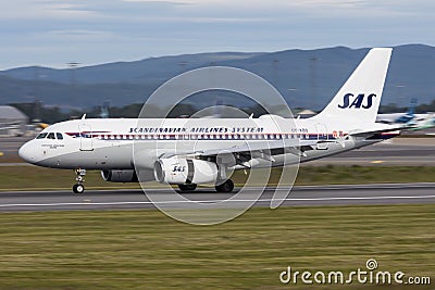 SAS Airbus A319 in retro colors paint sheme landing Editorial Stock Photo