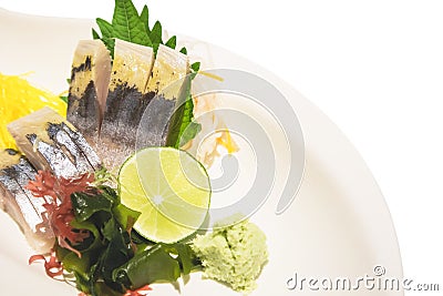 Sashimi sliced raw japanese fish dish on white Stock Photo