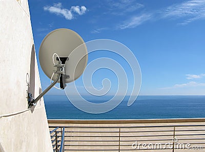 Satellite antenna on wall Stock Photo