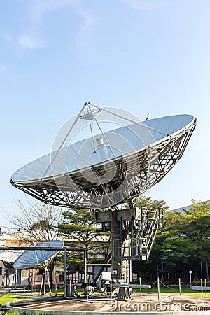 Satellite dish radar antenna station in field. parabolic antennas. Big parabolic antenna against sky. Satellite dish at earth stat Stock Photo
