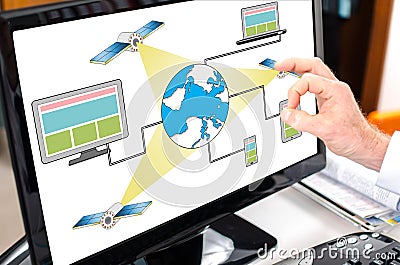 Satellite network concept on a computer monitor Stock Photo