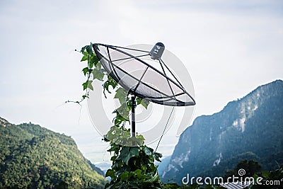 Satellite signal transmission plate in Akha hill tribe village of Ban Phahee Stock Photo