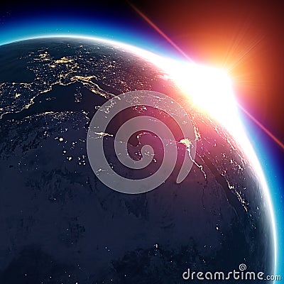 Satellite view of the Earth seen from space. The sun rising over the Europe and north Africa Stock Photo
