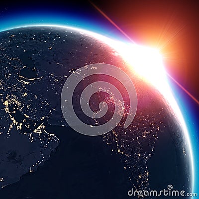 Satellite view of the Earth seen from space. The sun rising over the Middle East, India Stock Photo