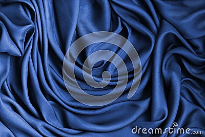 Satin fabric drape blue abstract background Stock Photo