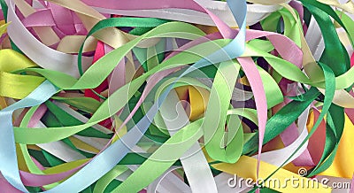 Satin ribbons of different colors background Stock Photo