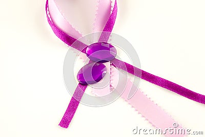 Satin ribbons and polished gems Stock Photo