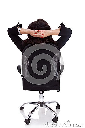 Satisfied business woman with hands crossed Stock Photo