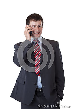 Satisfied young entrepreneur makes business call Stock Photo