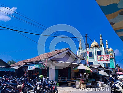 Saturday, August 2023 neatly parked rows of motorbikes, lots of food vendors on the roadside at the market in Bandar Lampung Editorial Stock Photo
