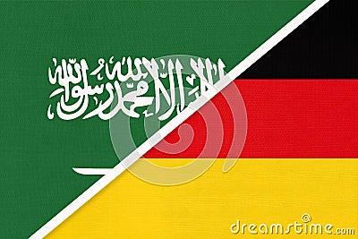 Saudi Arabia and Germany, symbol of national flags from textile. Championship between two countries Stock Photo