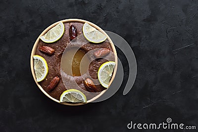 Saudi Arabia traditional dish Hineni, it is a mixed of dates and whole wheat. Ramadan food Stock Photo