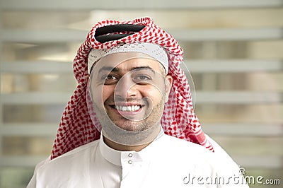 Saudi Arabian young businessman standing in the office Stock Photo