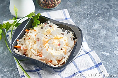 Homemade Sauerkraut with seasonings in an gray bowl. Natural Probiotics, Healthy Food Stock Photo