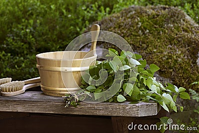 Sauna whisk and wooden pall Stock Photo