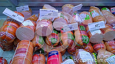 Sausage and lunch meat products on a supermarket shelves. Retail industry. Concept of problem rising food price. Sale and shopping Editorial Stock Photo
