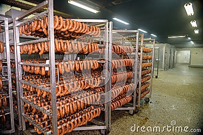 Meat sausage processing in factory Stock Photo