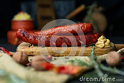 Sausages with cheese fried with spices and herbs Stock Photo