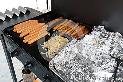 sausages cooking on a bbq in Australia Stock Photo