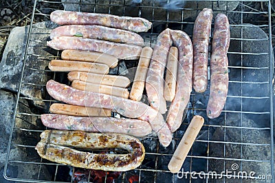 Sausages on grill Stock Photo