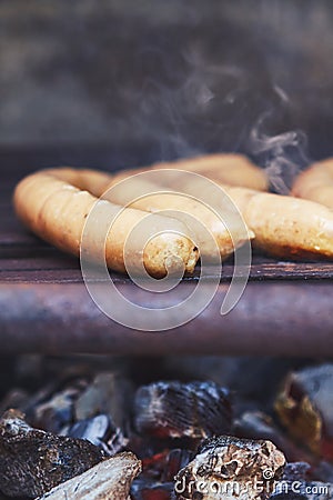 Sausages on grill Stock Photo