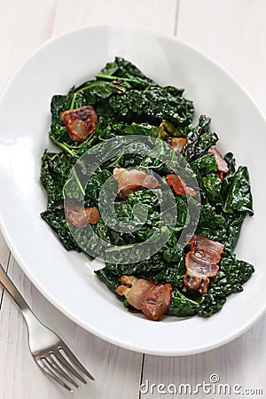 Sauteed black kale and bacon Stock Photo