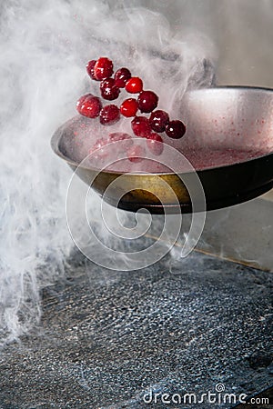 Cherry sauce for poultry in a pan Stock Photo