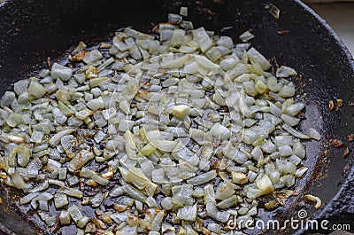 Sauteed onions in pan Close-up Stock Photo