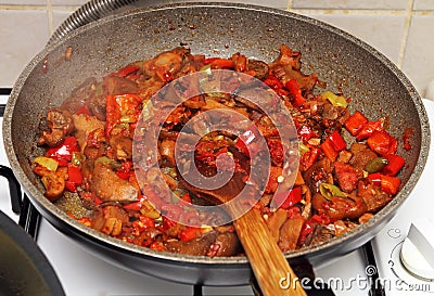 SautÃ©ing mushrooms Stock Photo