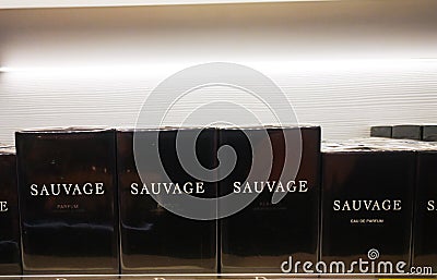 Sauvage Parfum by Christian Dior is a fragrance for men, it belongs to the oriental fougere group, sold in a cosmetics and Editorial Stock Photo