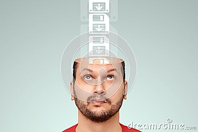 Save cards fall into the man`s open head. The concept of memory work, memorization process, brain work. copy space Stock Photo