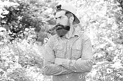 Save environment. Eco activist. Man handsome bearded guy in sunny forest. United with environment. Go green think fresh Stock Photo