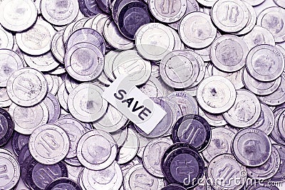 Save money concept above algeria coin Stock Photo